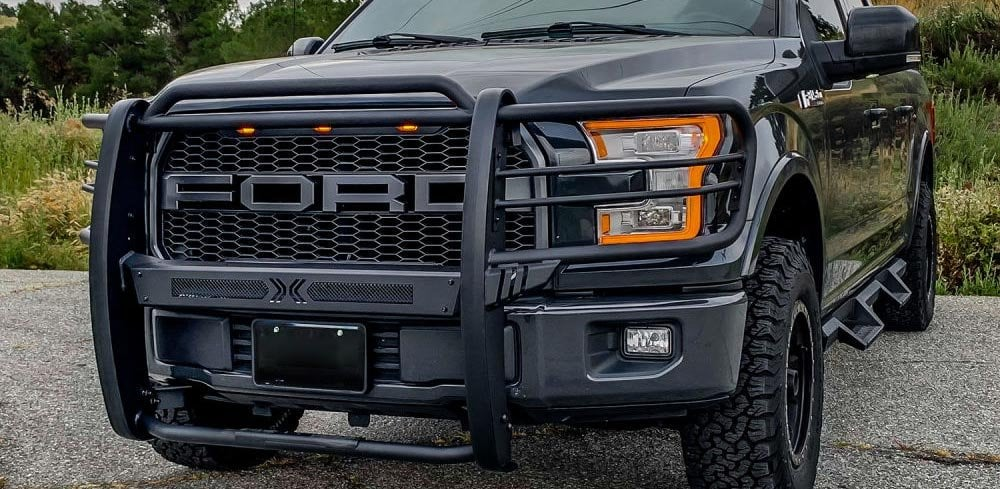 Truck with grille guard highlighting front-end protection and rugged styling.
