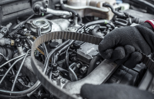 A car belt being held near the camera during a car service appointment near Orangeburg, South Carolina