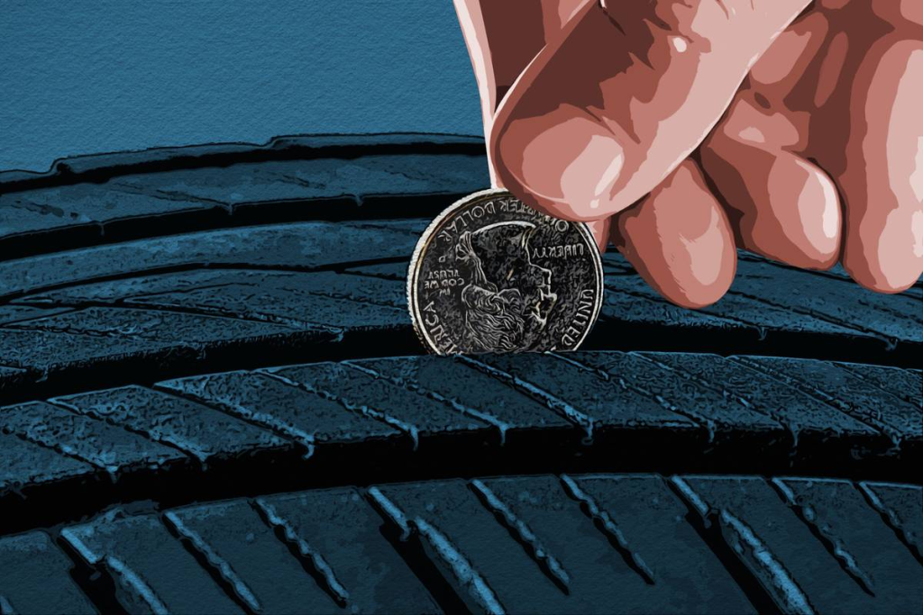 Two new car tires propped up together for tire replacement service