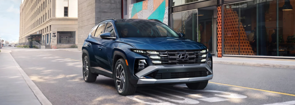2026 Hyundai Tucson SEL Premium compact SUV driving through Topeka traffic