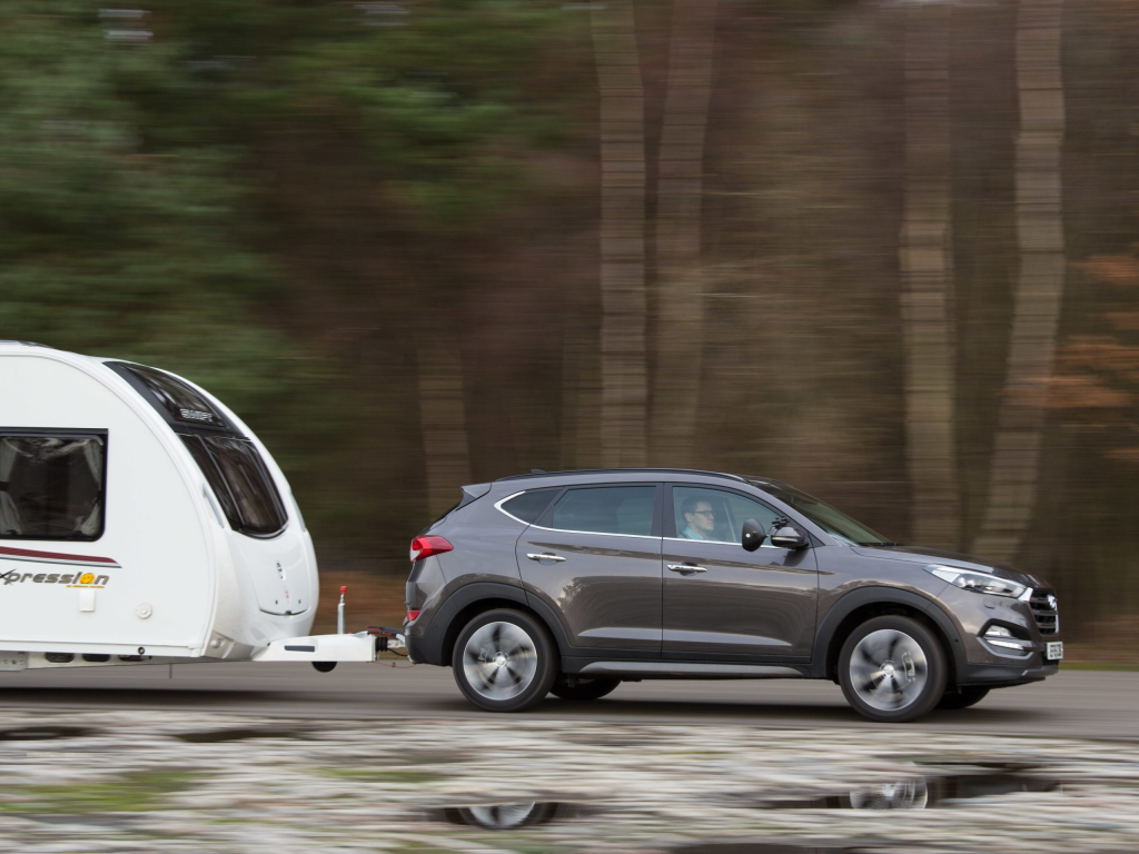 2026 Hyundai Tucson towing a small utility trailer near Topeka KS