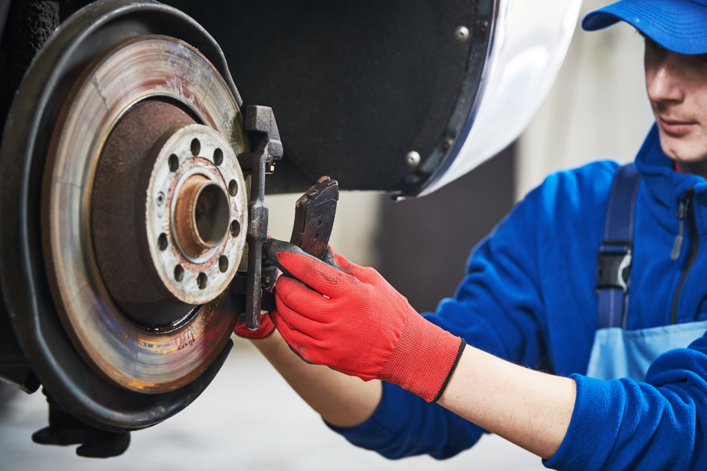  Hyundai brake pad being visually inspected through wheel spoke at McCarthy Hyundai of Lawrence KS