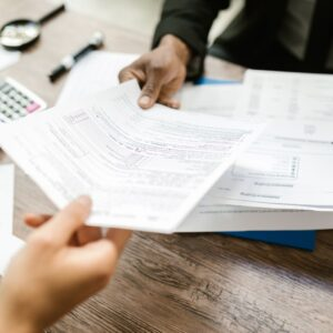 Kansas vehicle title document and TR-720B form for replacement at county treasurer office