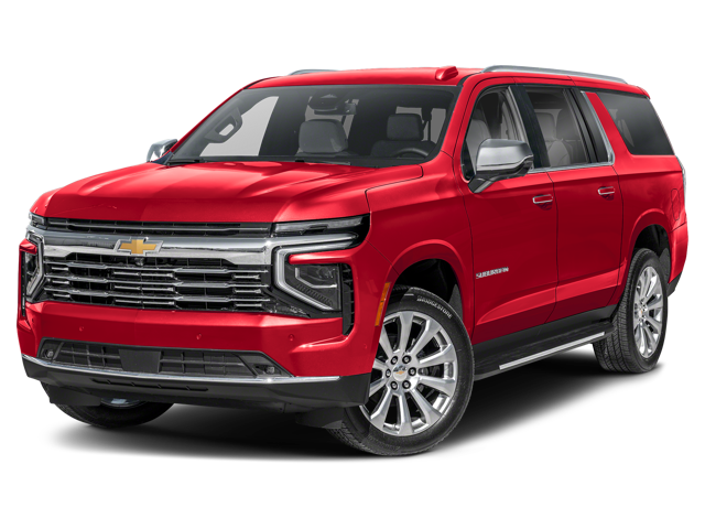 Front 3/4 view of a shiny red Chevrolet Suburban SUV against a black background.