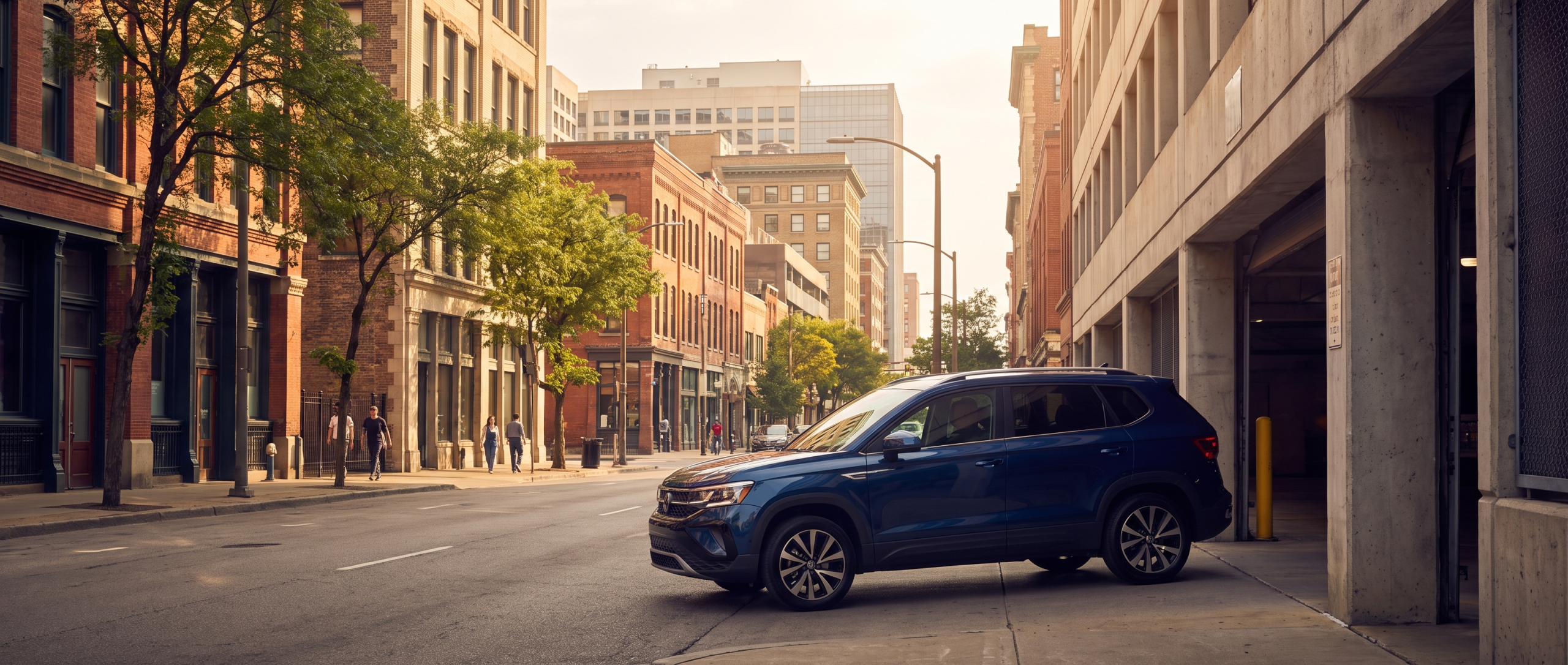 2026 Volkswagen Taos entering a downtown parking garage in Spartanburg, SC
