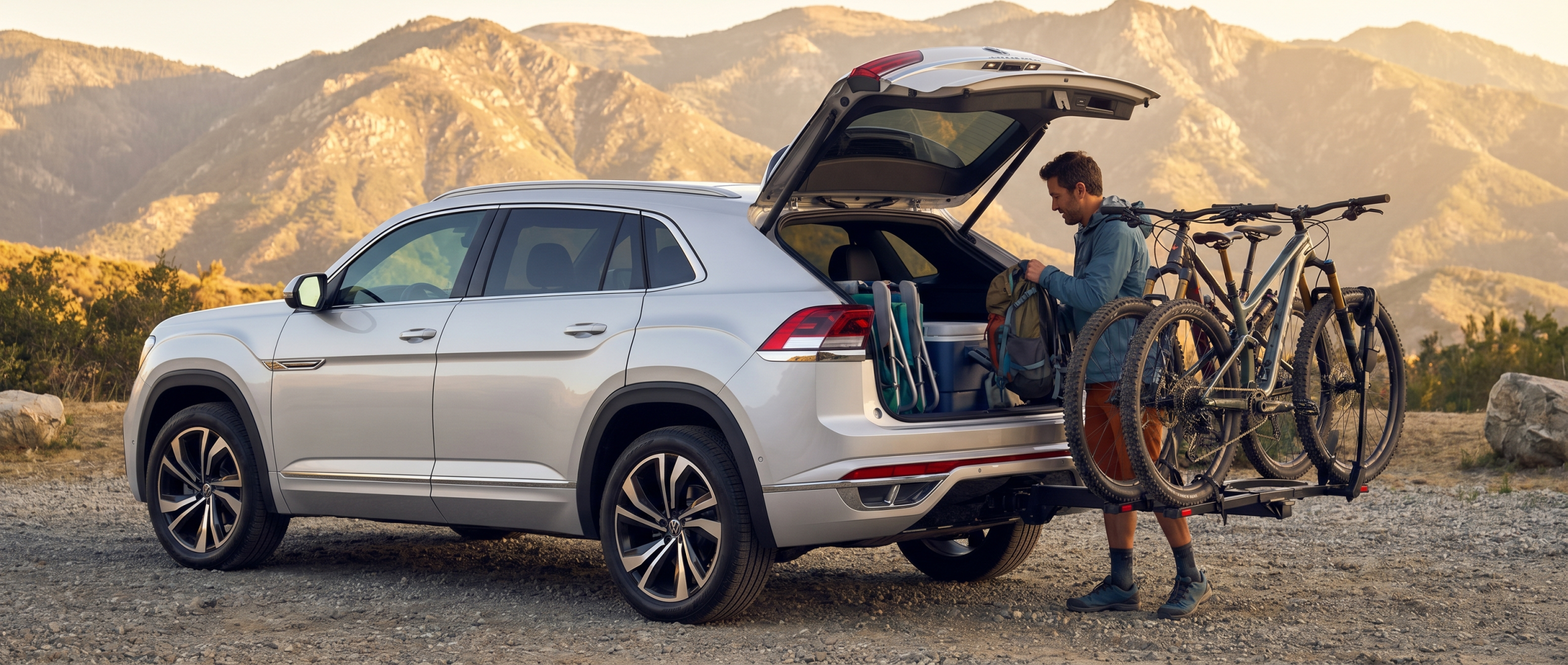 VW Atlas Cross Sport with outdoor adventure gear at mountain trailhead in Spartanburg SC