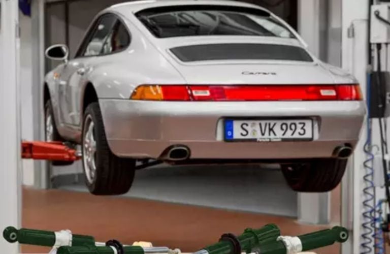 rear view of a Porsche at service center