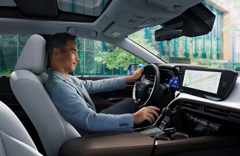 One man is driving a car