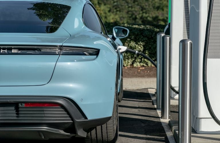 Porsche car getting charged. 
