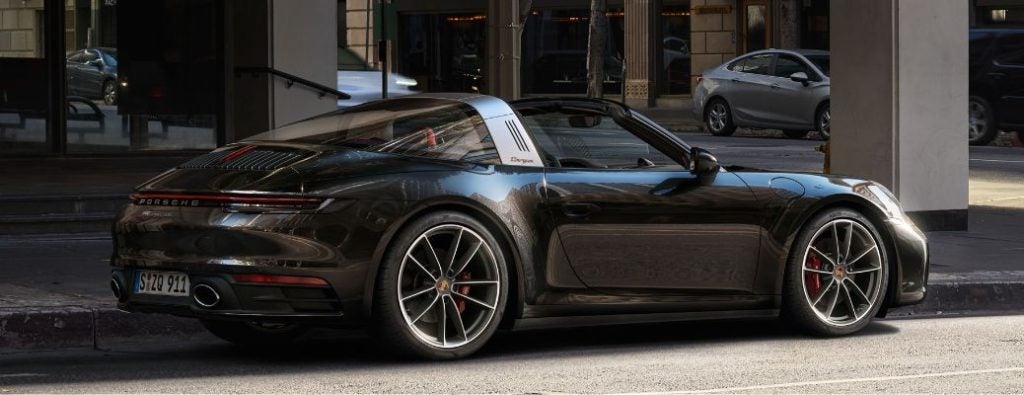 2021 Porsche 911 Targa is parked beside road.
