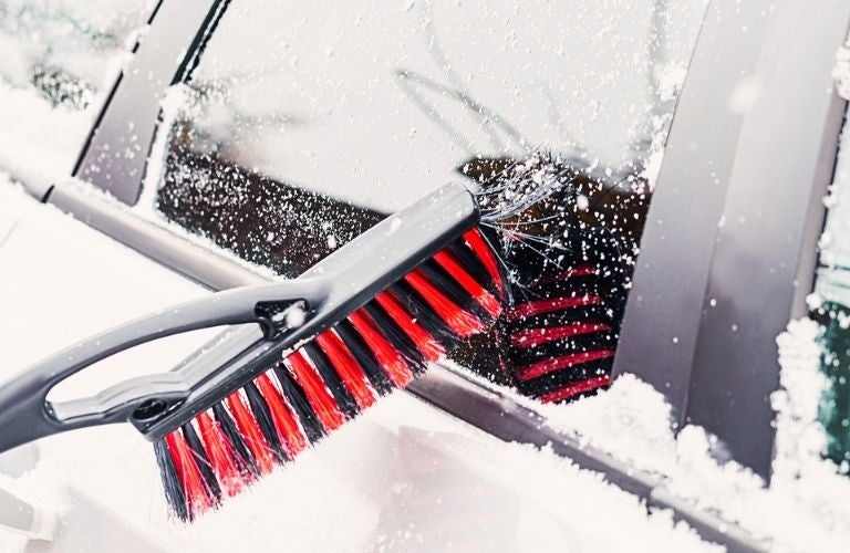 removal of snow from a car's window