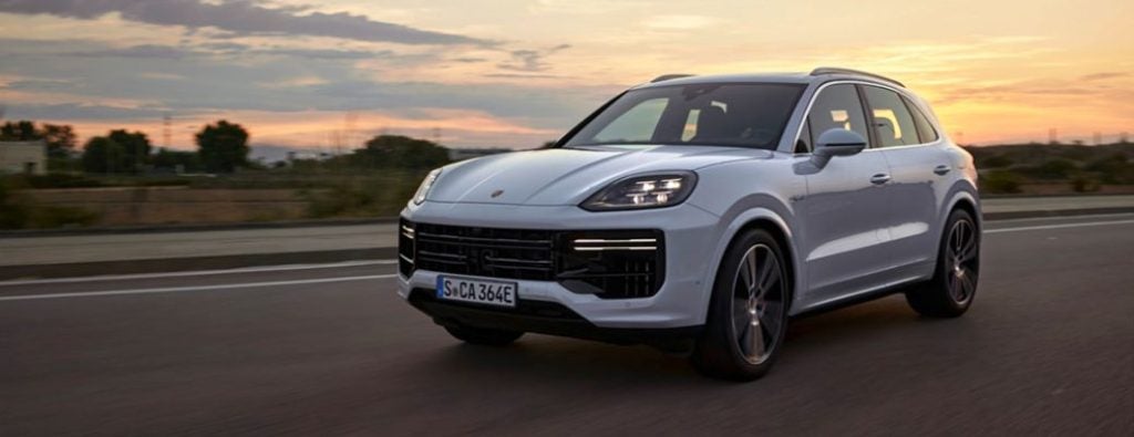 2024 Porsche Cayenne is running on the highway.