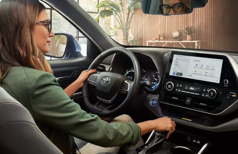 One woman is driving a car