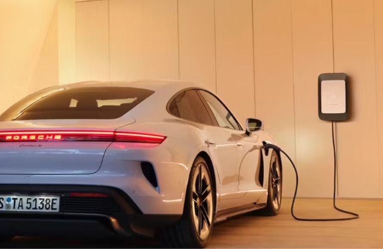 rear view of the 2025 Porsche Taycan 4S being charged