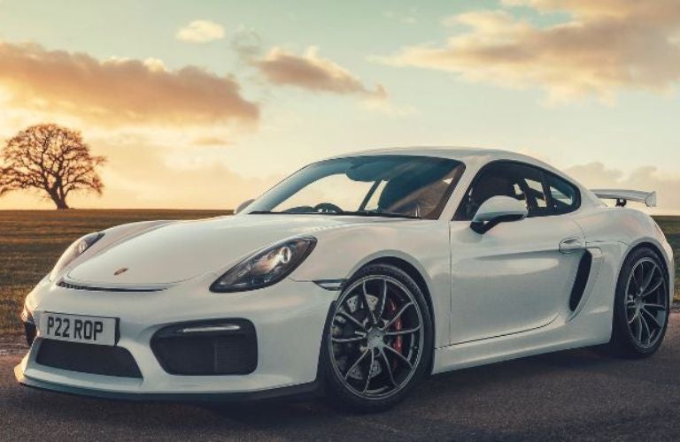 white Porsche Cayman GT4
