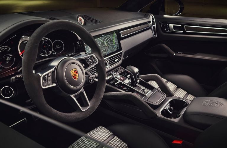 Interior of a black Porsche Cayenne