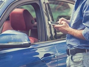 Man using Cell - Phone