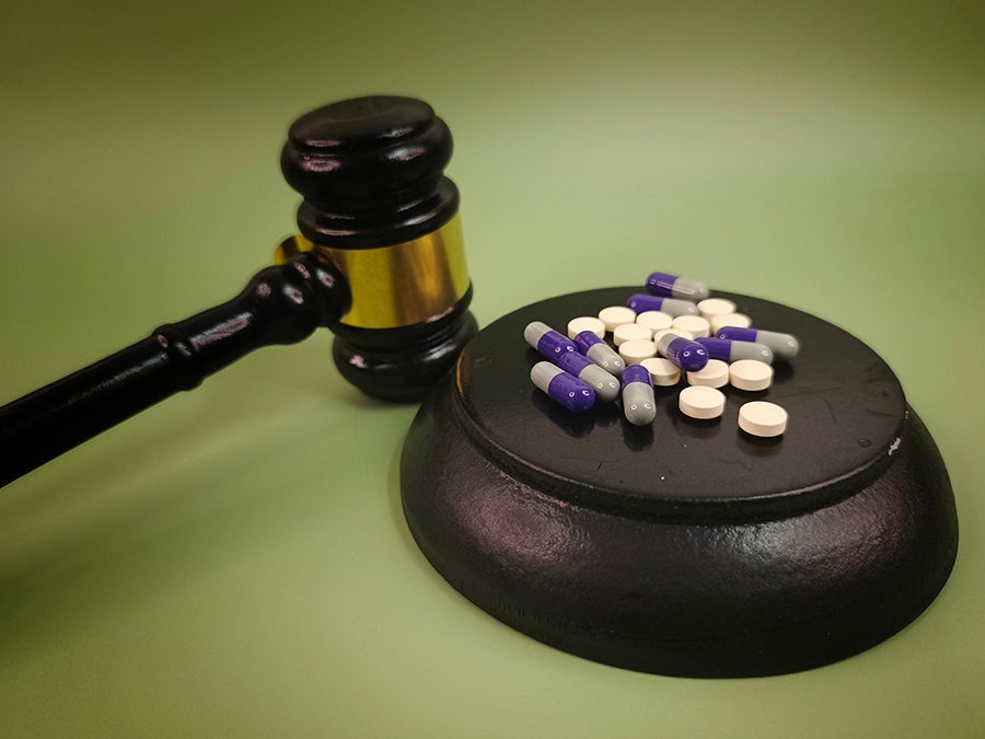 Judge Gavel with Capsules and Pills