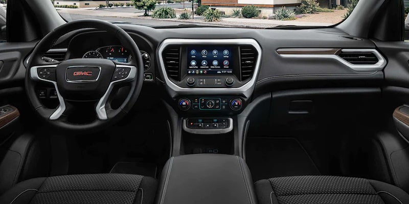 The image shows a wide-angle view from the front seats