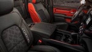 2019 Ram 1500 Rebel interior with black and red accented seats