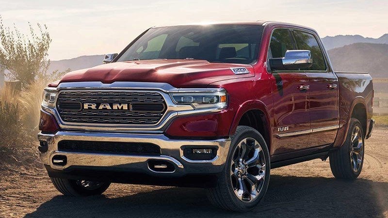 Red 2019 Ram 1500 Limited on a desert road, front three-quarter view