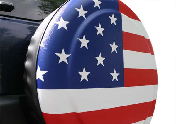 American flag spare tire cover on the back of a Jeep