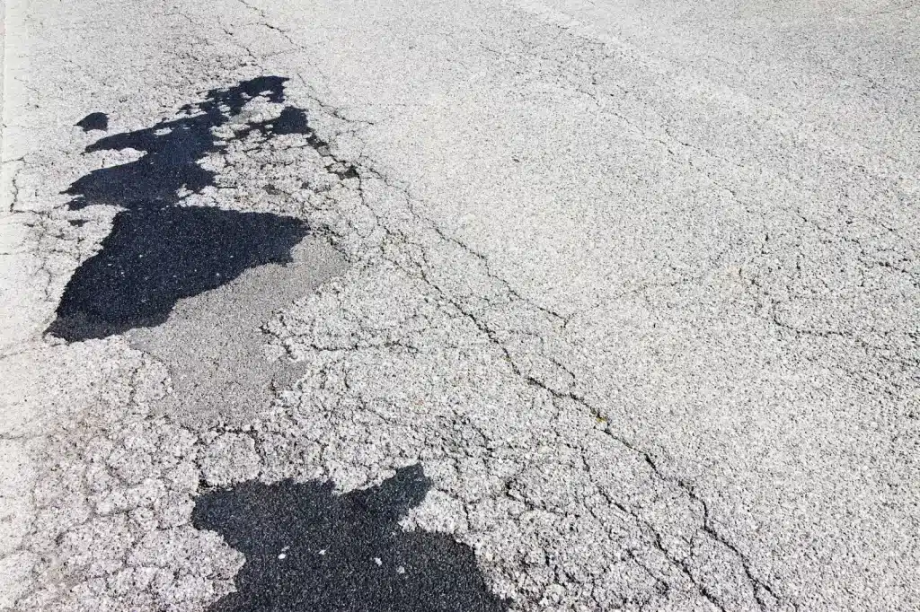 Car paint damage from old damaged roads