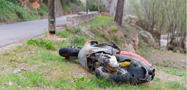 Motorcycle one side of the highway after an accident