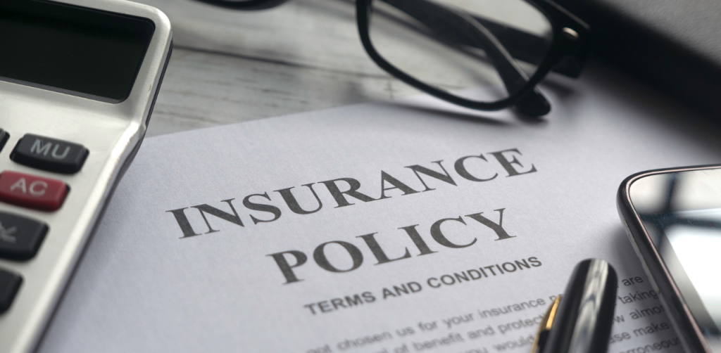 Close-up of an insurance policy document, emphasizing coverage importance for pedestrian safety