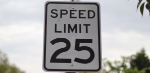 Speed limit 25 road sign, emphasizing traffic rules, safe driving, and accident prevention awareness