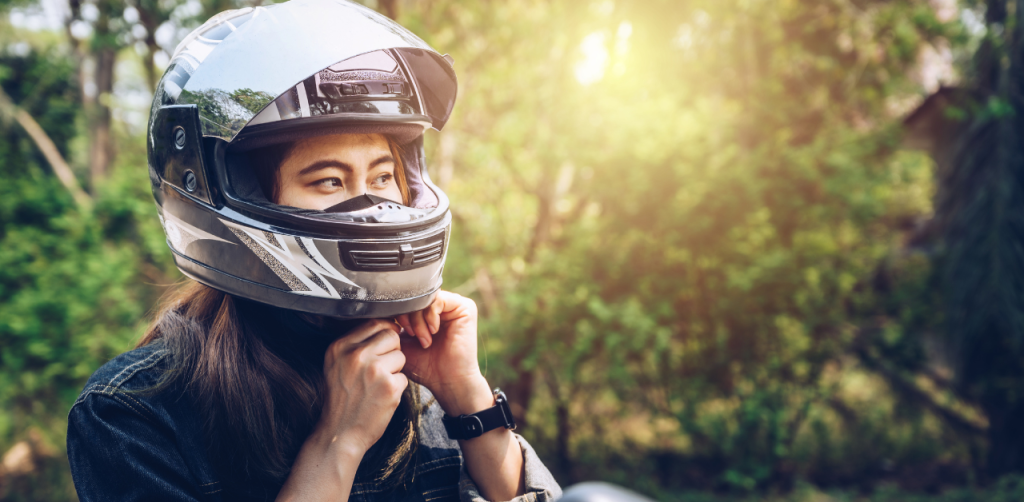 Woman Wearing Motorcycle Helmet