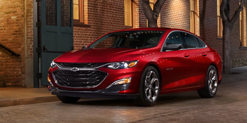 Red Chevrolet Malibu, front three-quarter view
