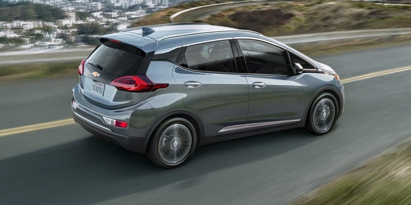 A silver 2022 Chevy Bolt EUV is driving 