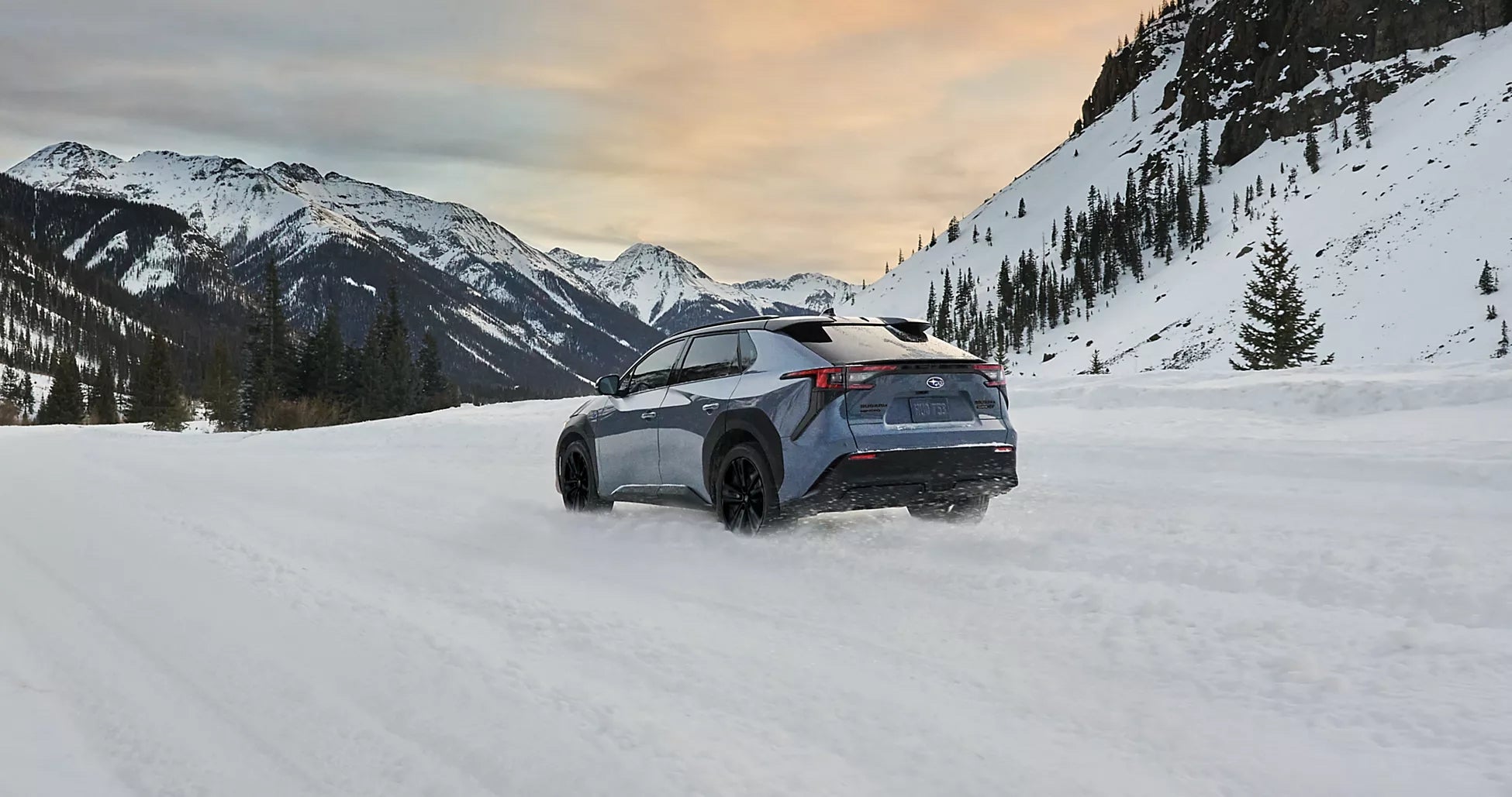 Subaru driving through Utah snow near Draper