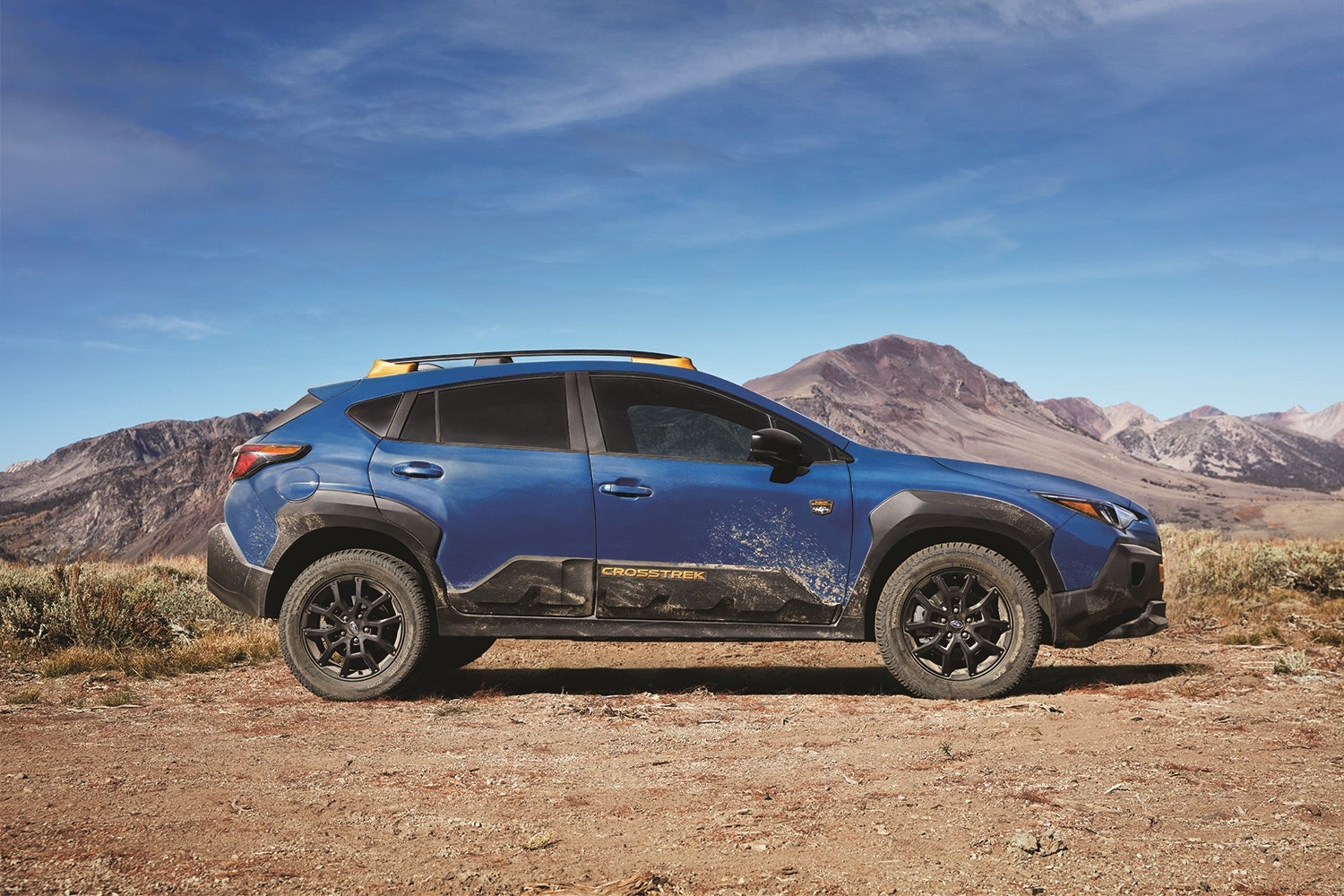 2026 Subaru Crosstrek driving a mountain road near Park City