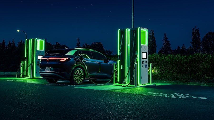 2023 Volkswagen ID.4 charging, exterior view, at Molle Volkswagen in Kansas City