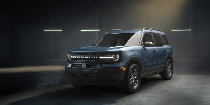 Blue Ford Bronco Sport photographed in a studio
