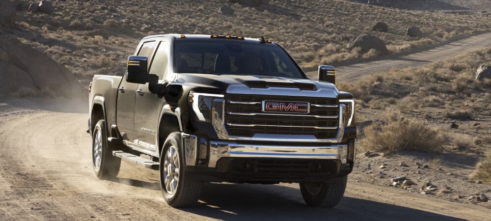2024 GMC Sierra 2500 Driving on Dirt Road
