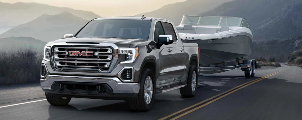 2022 GMC Sierra 1500 SLE Towing a Boat