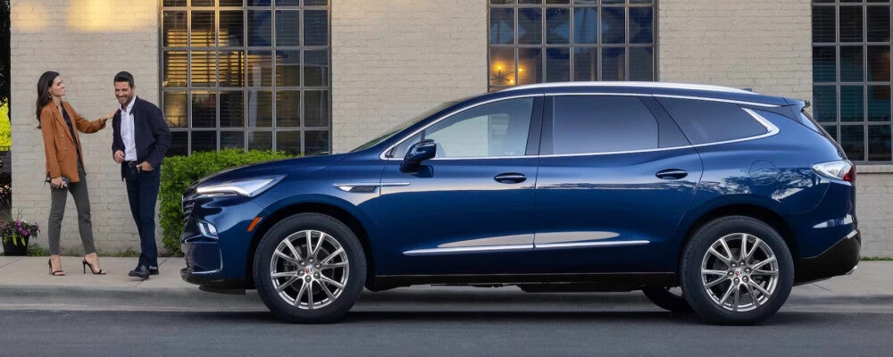 2024 Buick Enclave parked by building