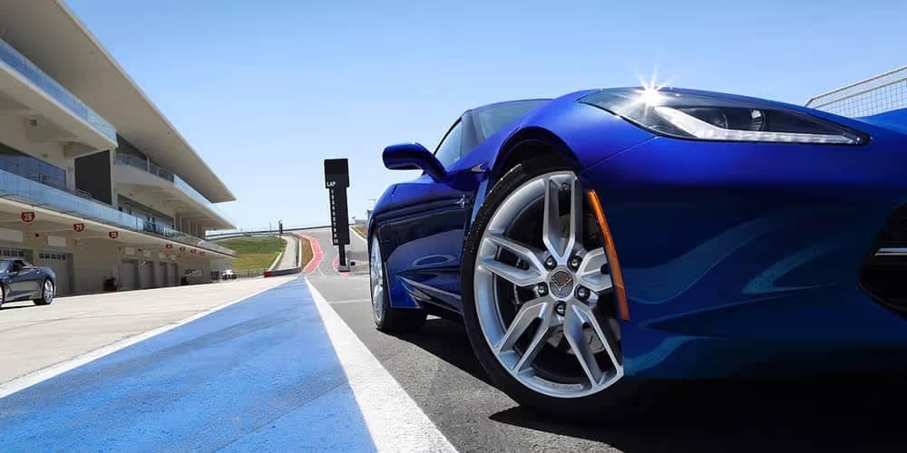 Front side view of Chevrolet Corvette on track