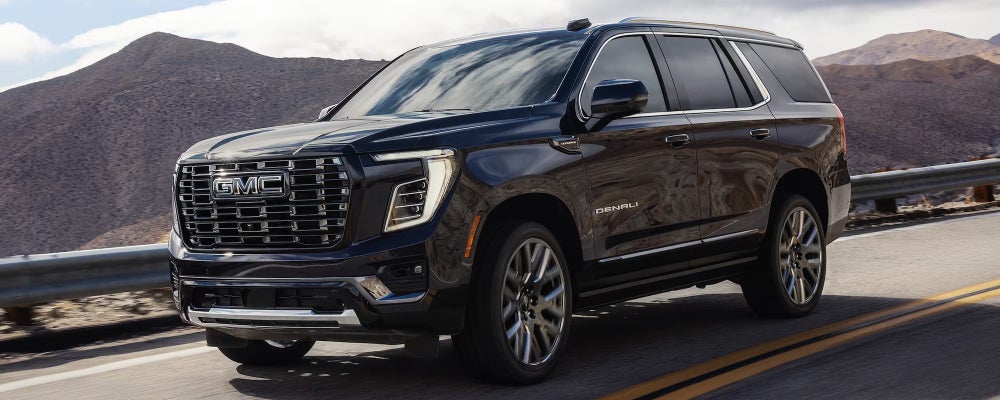 2026 GMC Yukon Denali Driving on Road
