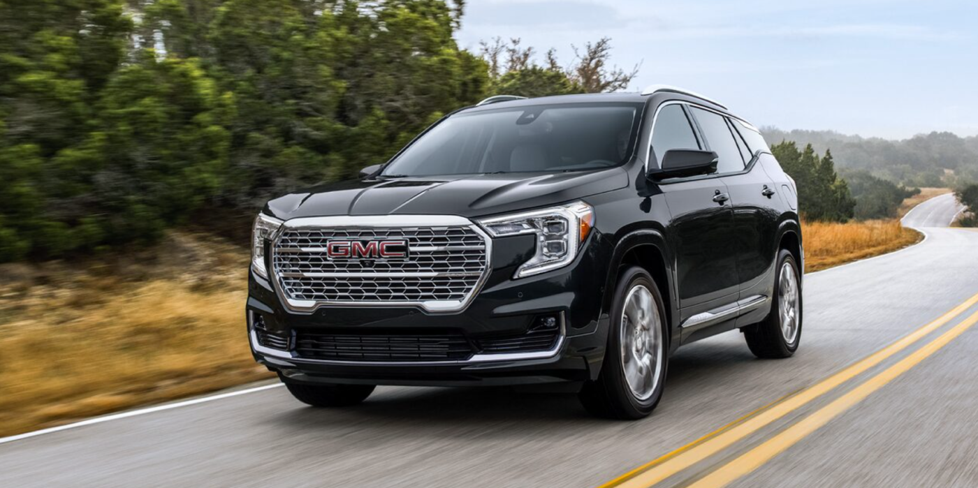 2024 GMC Terrain driving down a road