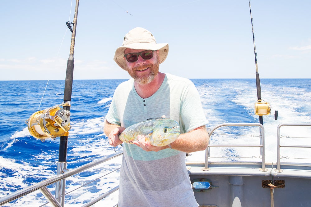 Man Holding Fish