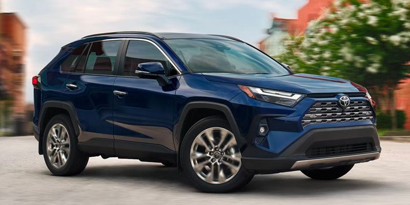 A dark blue 2025 Toyota RAV4