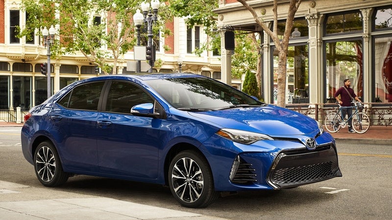 A 2019 Toyota Corolla parked outside a chic cafe in Philadelphia, PA 