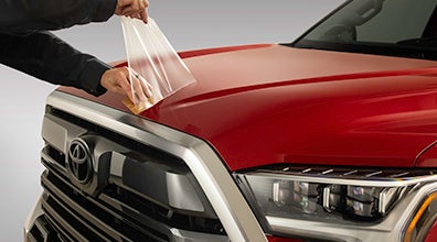 Paint Protection Film being applied to the hood of a Toyota Tundra