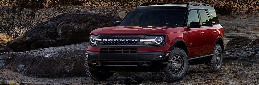 Ford Bronco in Rapid Red on Rocky Cliff