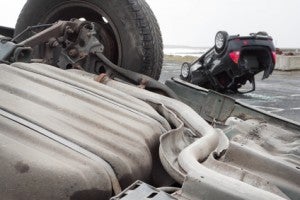 two cars turned upside-down