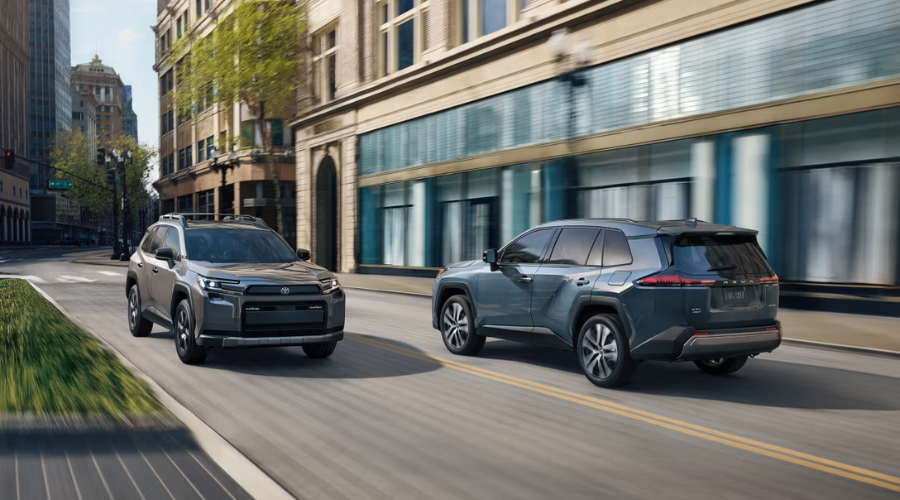 Two 2026 Toyota RAV4 for sale on test ride on streets outside the Classic Toyota showroom layout in Waukegan